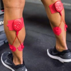 Therabody PowerDot 2.0 Duo Smart Muscle Stimulator -FOREO || Braun || Therabody Shop CopyofPowerDot DuoRed Calves 01 1