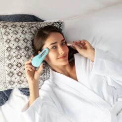 FOREO BEAR™ 2 Eyes & Lips Microcurrent Line Smoothing Device -FOREO || Braun || Therabody Shop FOREOBEAR2eyes lips ModelLifestyle 05